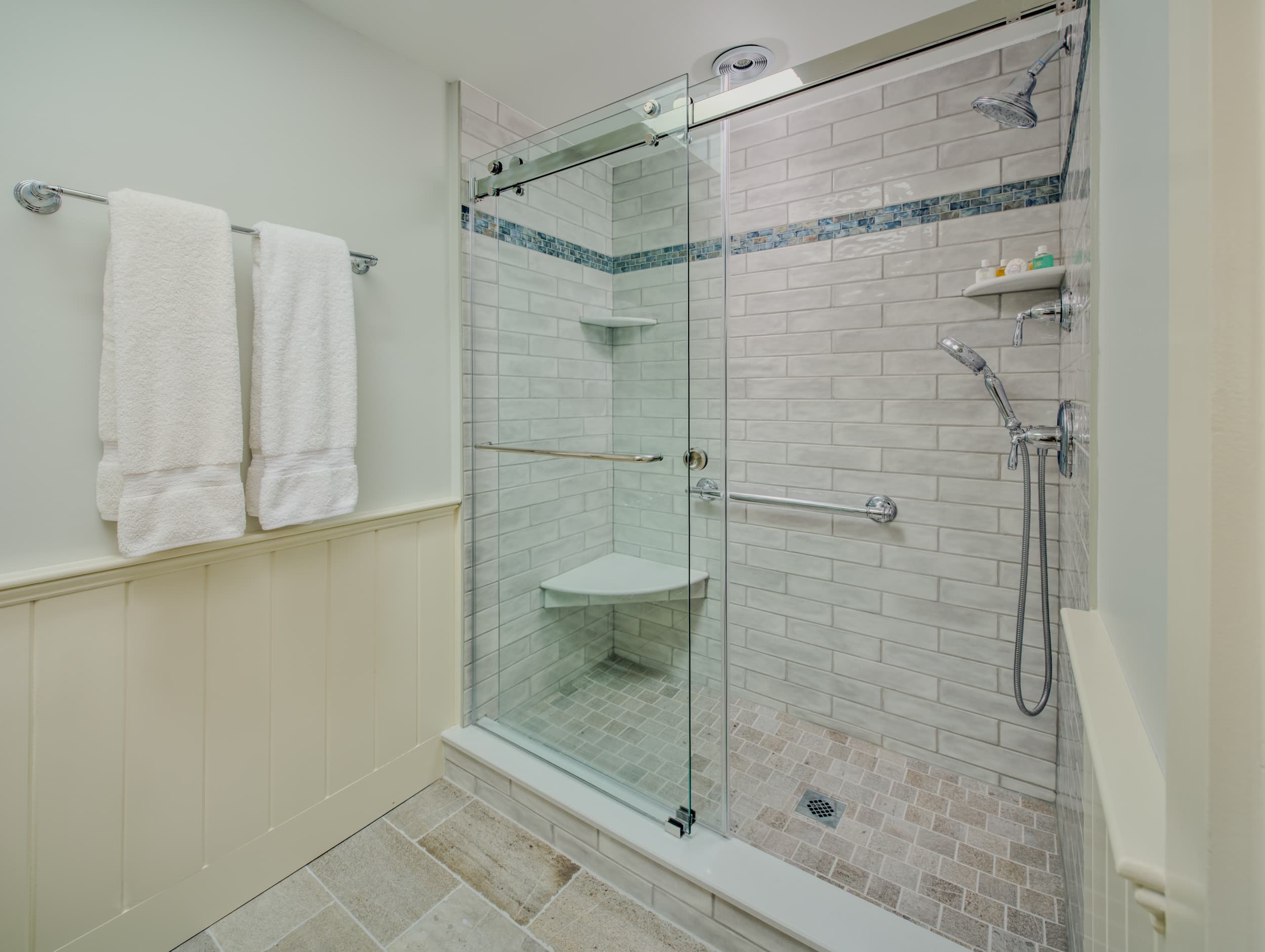 Glass Enclosed Shower with Off white tile