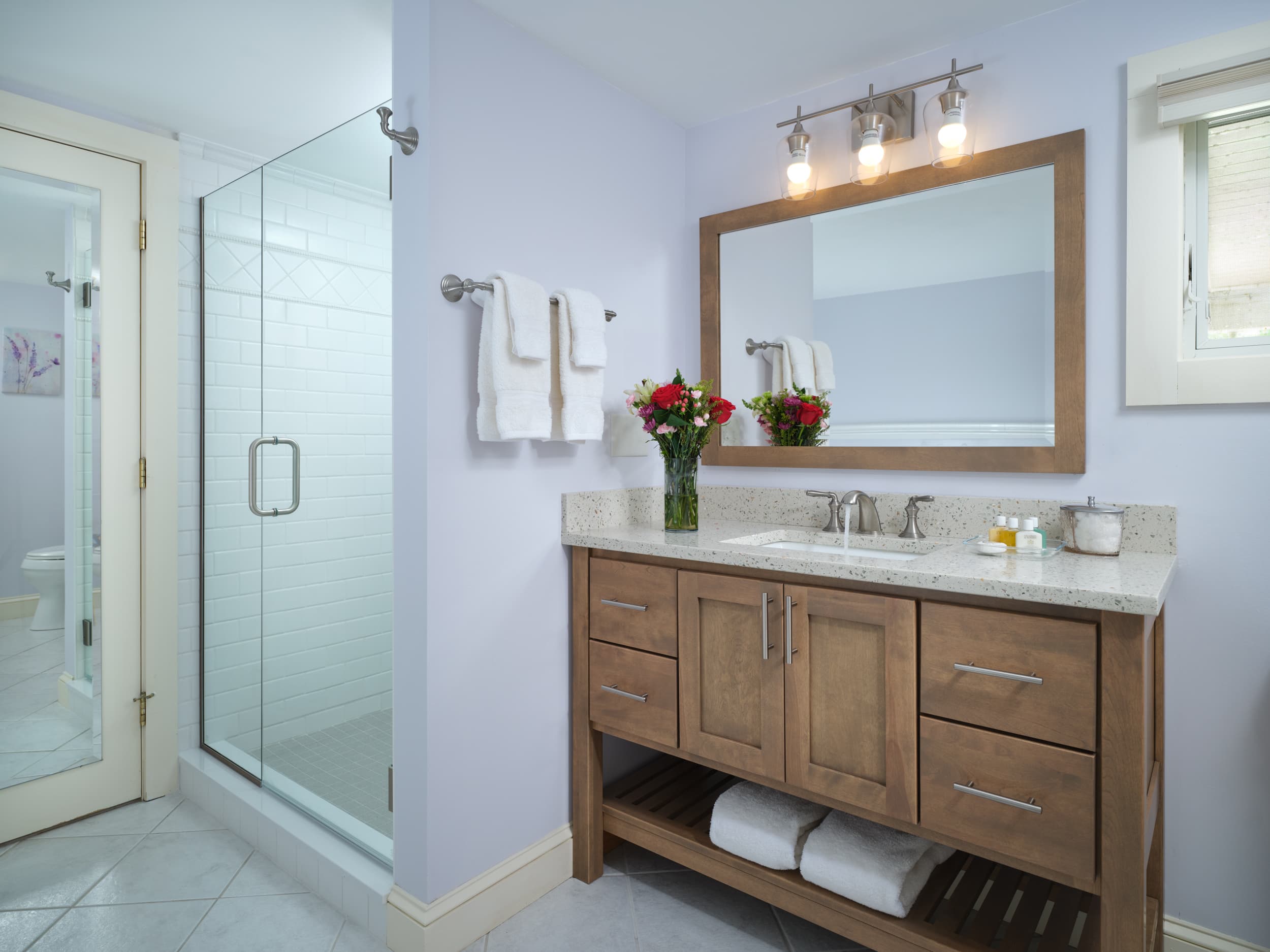 Luxury bathroom with large wooden vanity